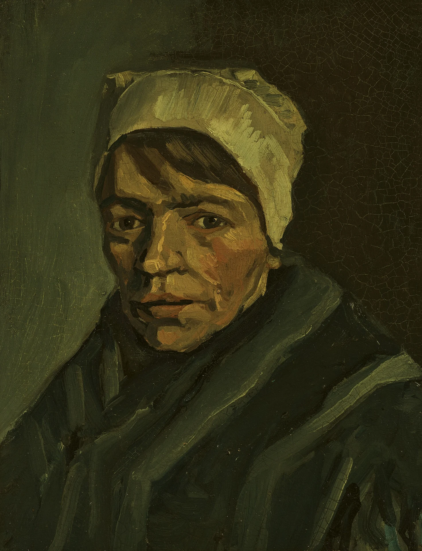 Vincent van Gogh, Head of a Woman with White Cap, 1885.