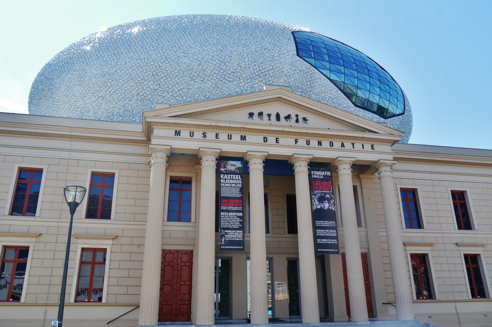 Museum de Fundatie with white columns and a blue dome.